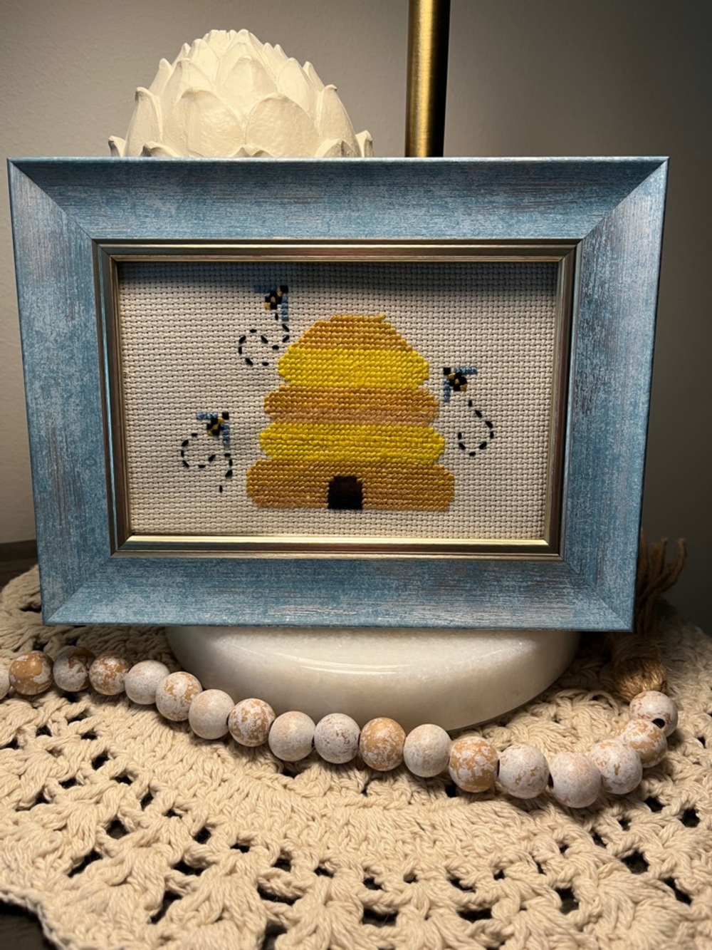 🐝 Framed Cross-Stitch Bee Skep Artwork in Yellow with blue frame.